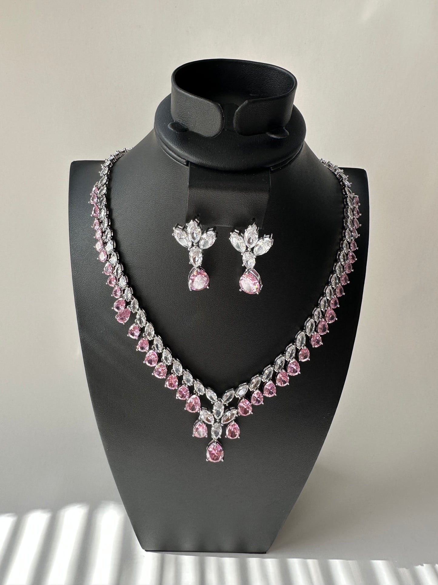 Pink zirconia water shaped necklace & pair of earrings (set)