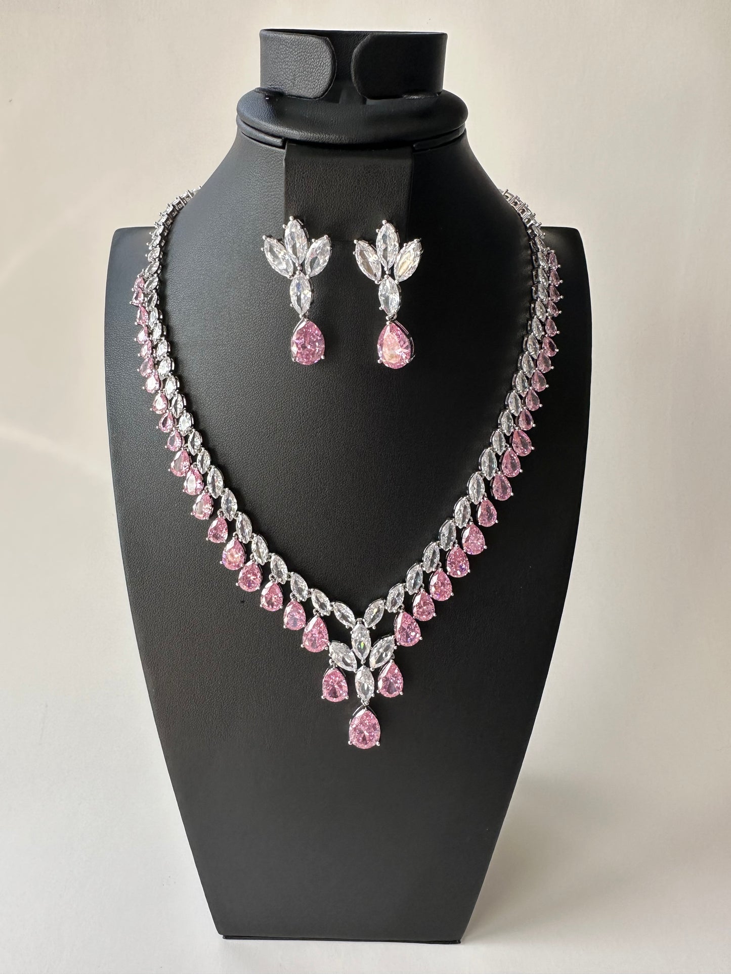 Pink zirconia water shaped necklace & pair of earrings (set)